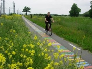 Man climbing the hill on an electric bike Man climbing the hill on an electric bike